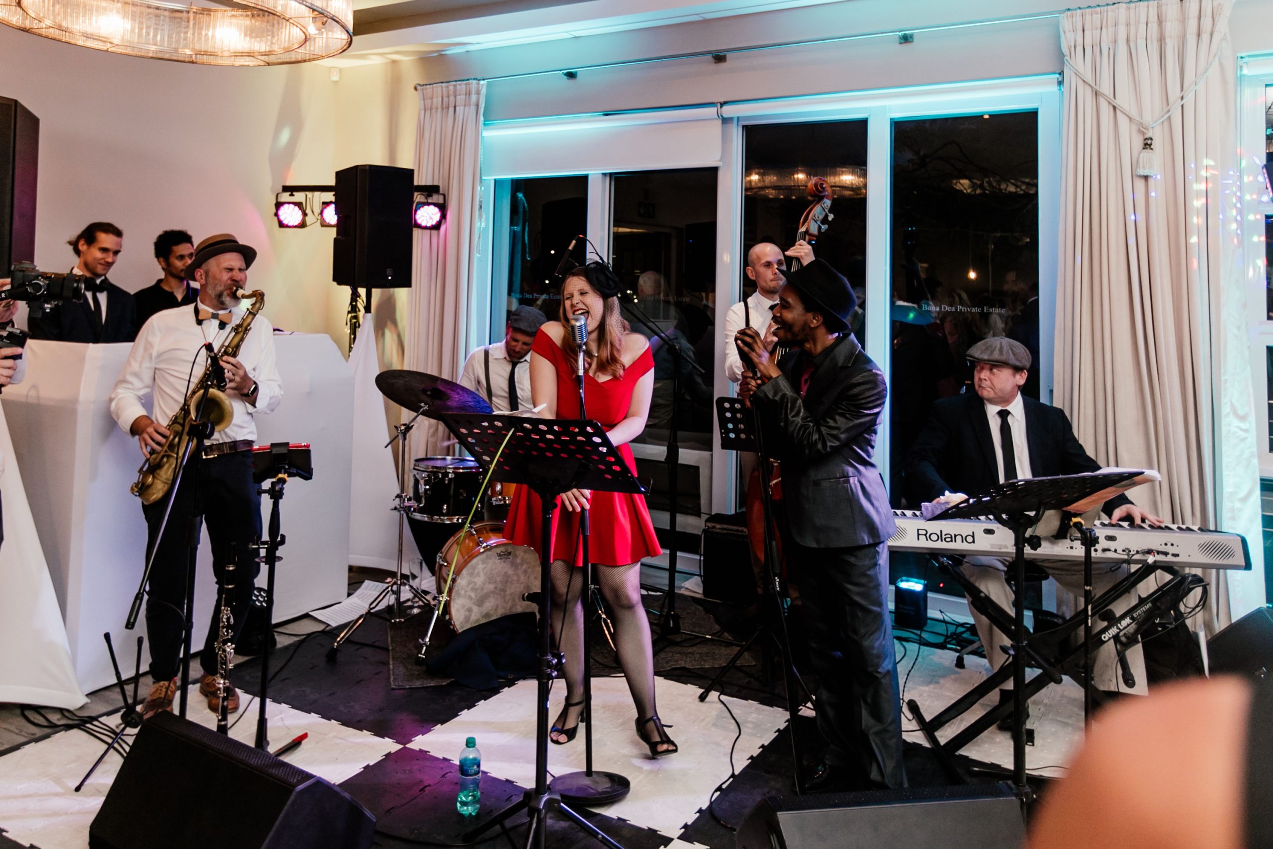 Live musicians performing at a ShoutMC wedding celebration